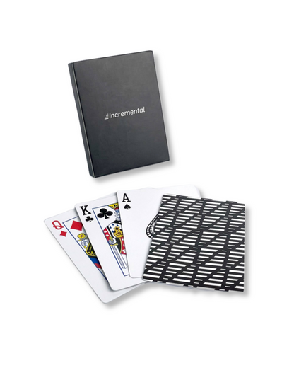 Pack of Incremental playing cards and cards fanned out in front